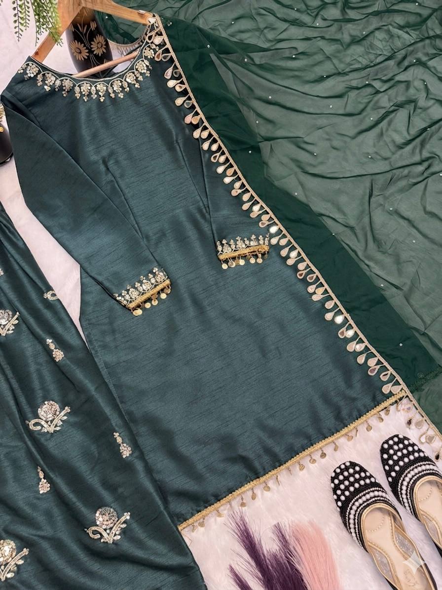 Majestic Emerald Green Kurta and Salwar Suit Set Featuring Intricate Gold Embroidery, Floral Motifs, and Ornate Coin Tassel Embellishments